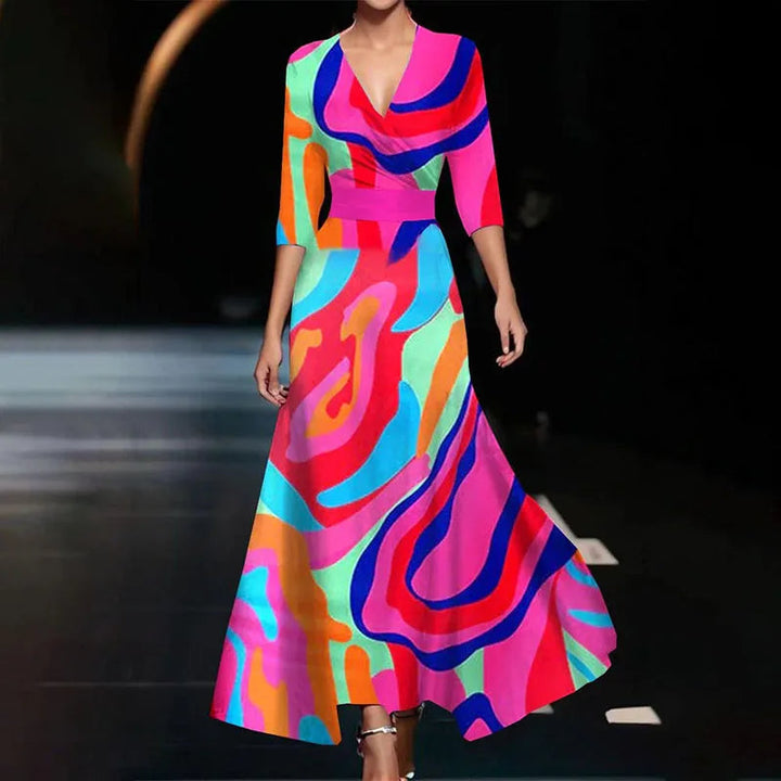 Chic women's floral print maxi dress. A-line, half-sleeve, V-neck. Perfect for formal events & parties.