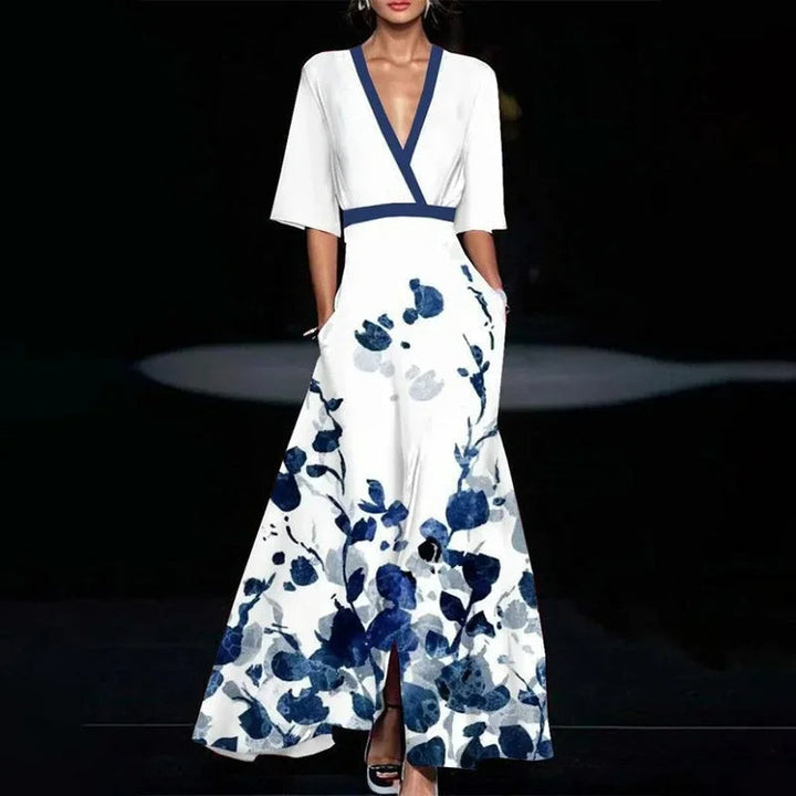 Women's sophisticated floral print maxi dress. V-neck, half-sleeve, A-line. Perfect party or wedding guest.