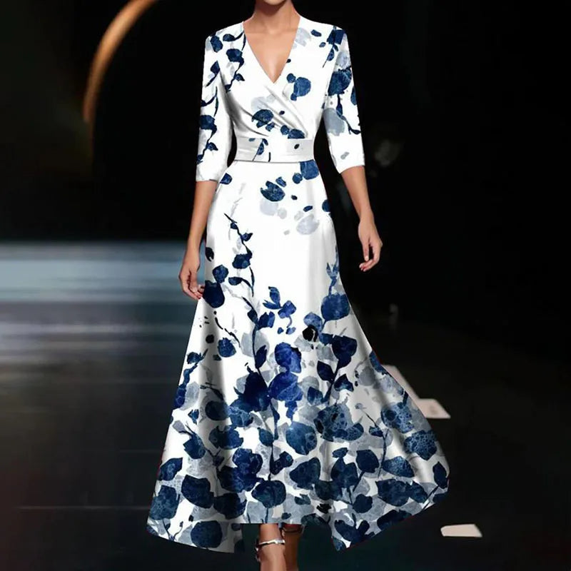 Floral print maxi dress for wedding guests. Elegant A-line cocktail gown, ideal for special occasions.