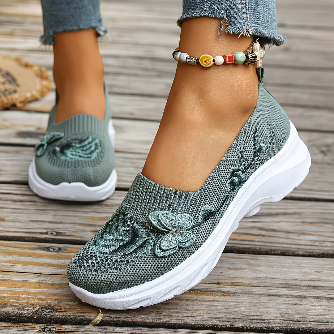 Embroidered floral women's orthopedic slip-on shoes, supportive for casual walking.