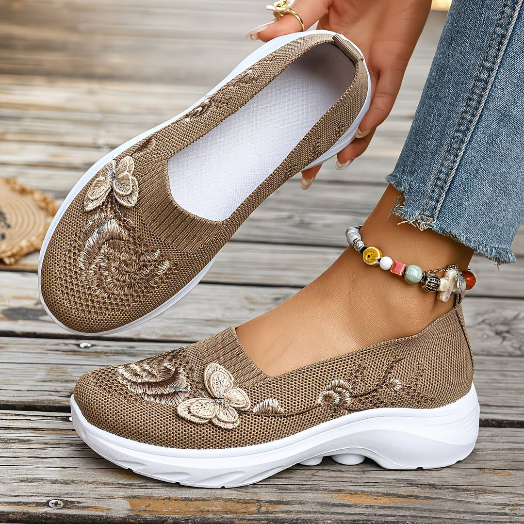 Fashionable floral slip-on orthopedic shoes for women, offering cushioned arch support.