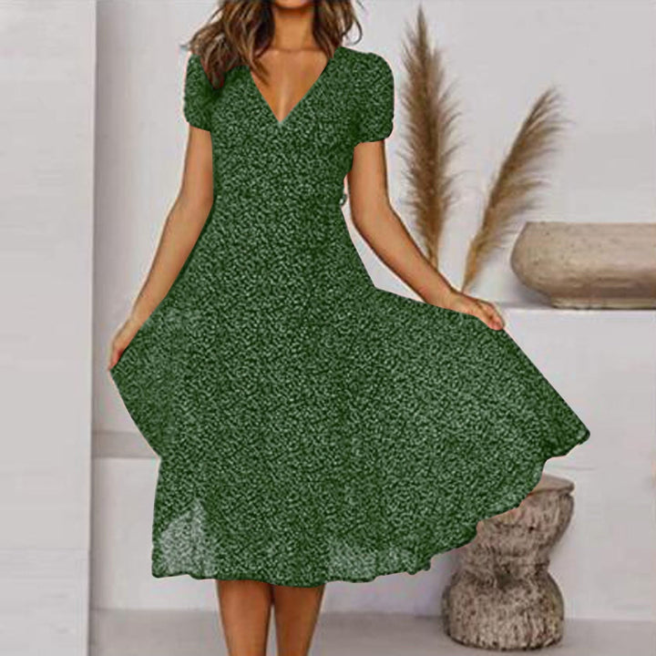 Women's elegant V-neck A-line midi dress with a flowing skirt. Perfect for versatile autumn fashion.