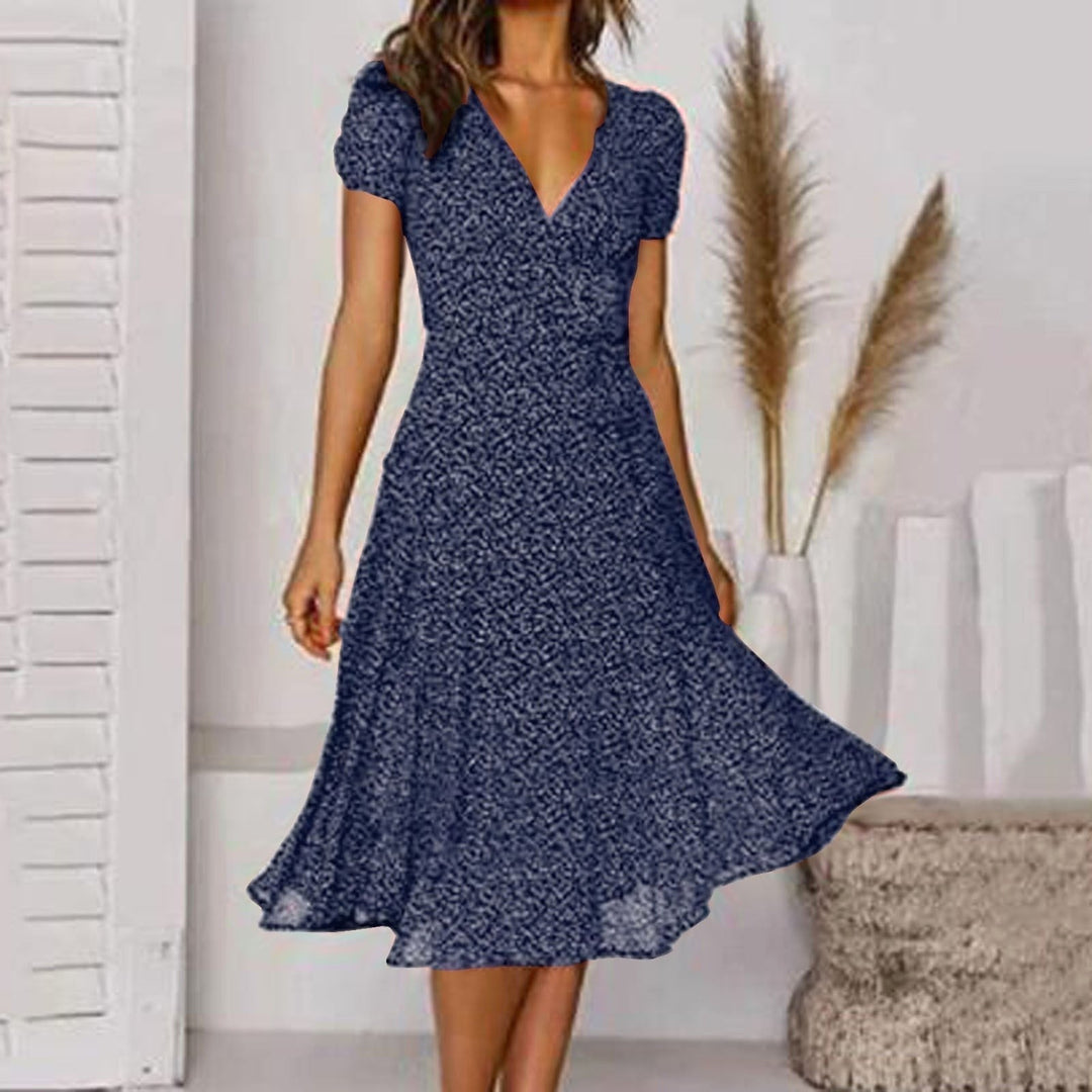 Comfortable women's V-neck A-line midi dress, featuring a flattering A-line cut and flowing skirt.