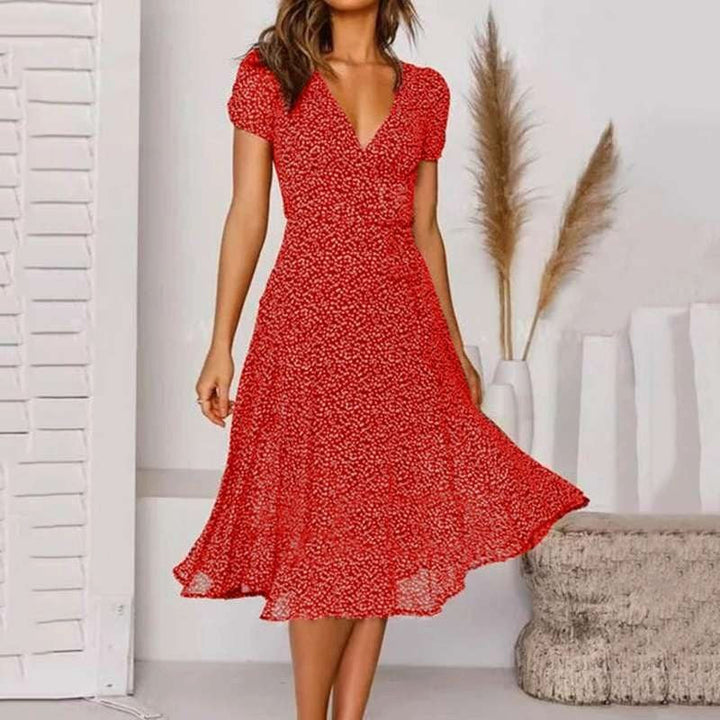 Women's V-neck A-line midi dress. Elegant flowing style, comfortable, great for versatile autumn looks.