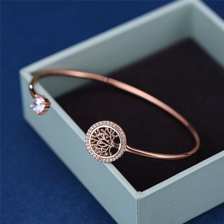 Elegant silver Tree of Life bracelet for women, featuring an adjustable band, symbolizing growth and connection.