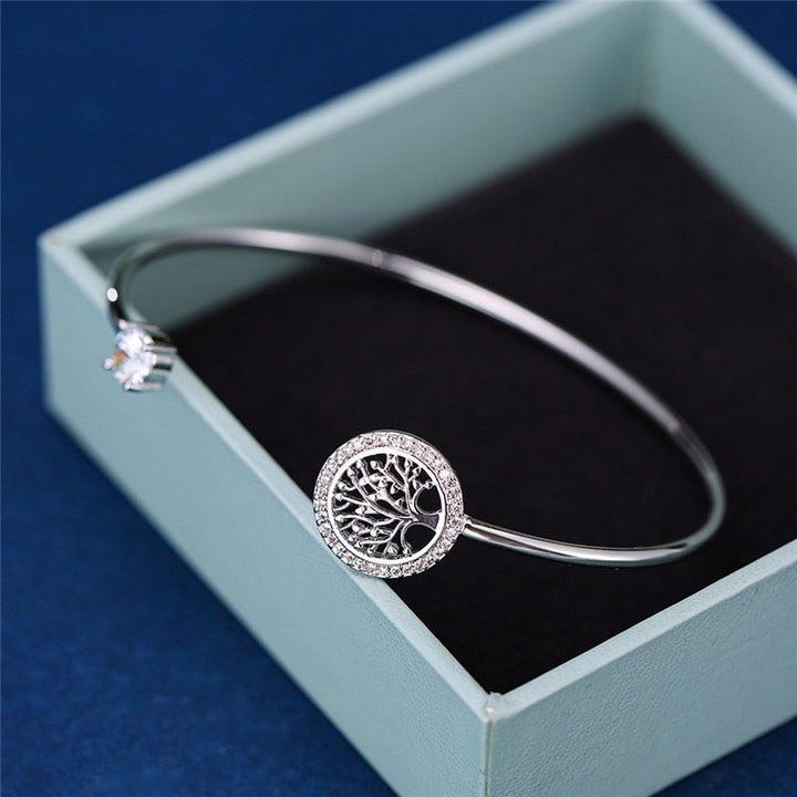 Rose gold adjustable Tree of Life bracelet for women. A meaningful symbolic jewelry and fashion accessory.
