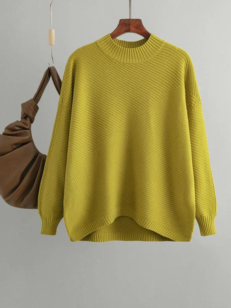 Close-up of the soft texture on a women's ribbed knit jumper, showcasing quality and comfort.