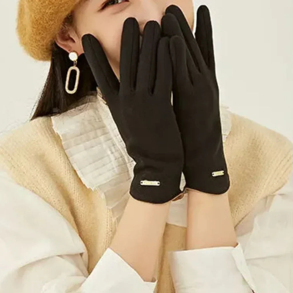 Soft suede women's winter gloves featuring touchscreen tech and a warm cashmere lining.