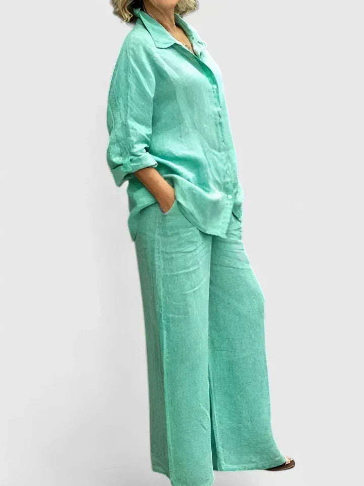 Soft fabric close-up of women's comfortable matching set: button-down shirt & wide-leg pants. Chic loungewear.