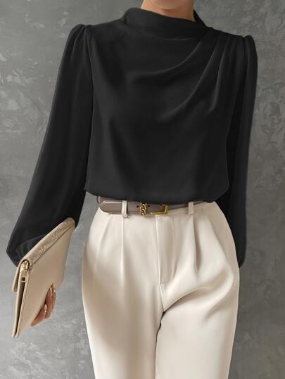 Close-up: elegant women's bishop sleeve blouse, draped neckline & flowy fabric. A sophisticated top.