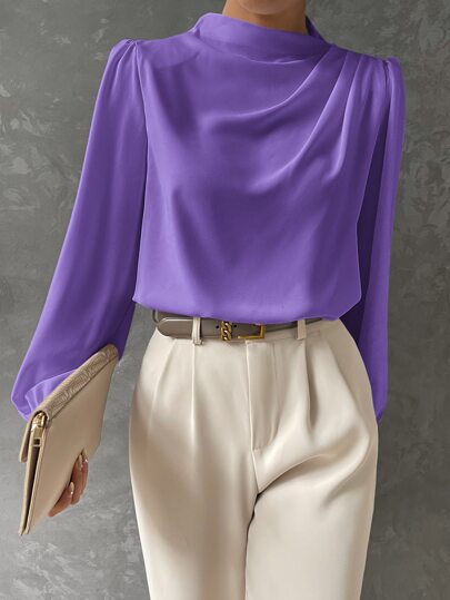 All-season women's top: an elegant bishop sleeve blouse in a smart casual, versatile style.
