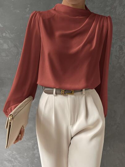 Women's long sleeve blouse with dramatic bishop sleeves for an elegant, flowy and modern look.
