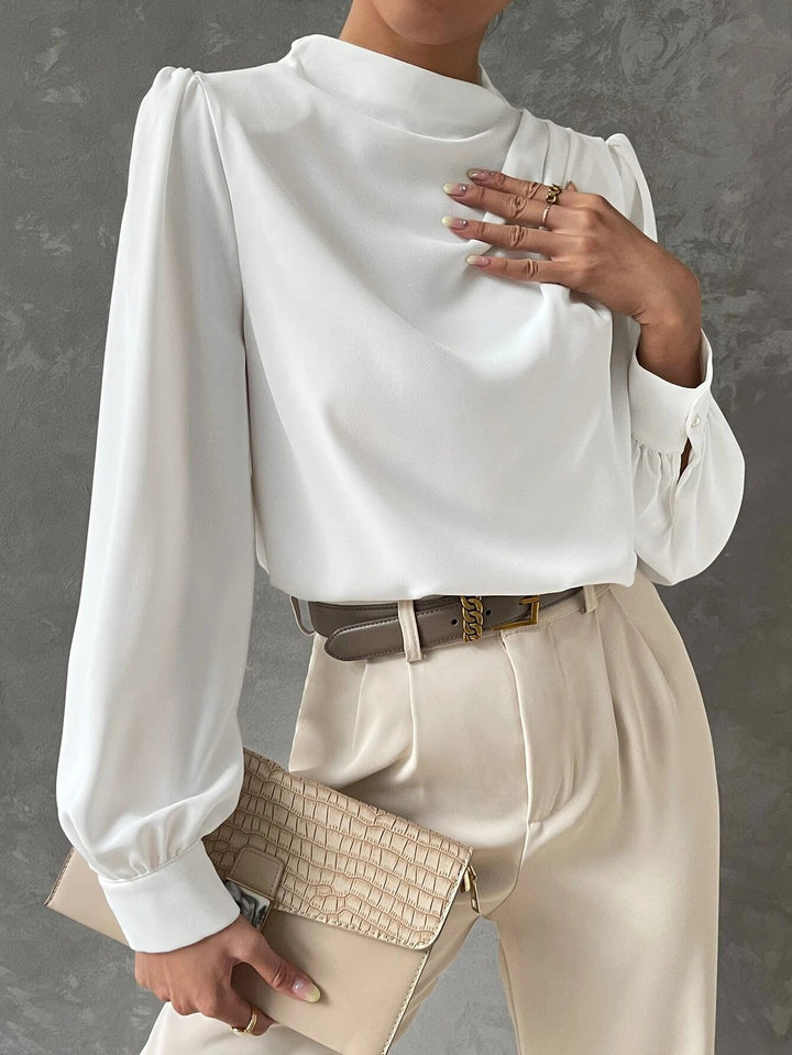 Front view of a women's versatile bishop sleeve top, suitable for office or evening occasions.