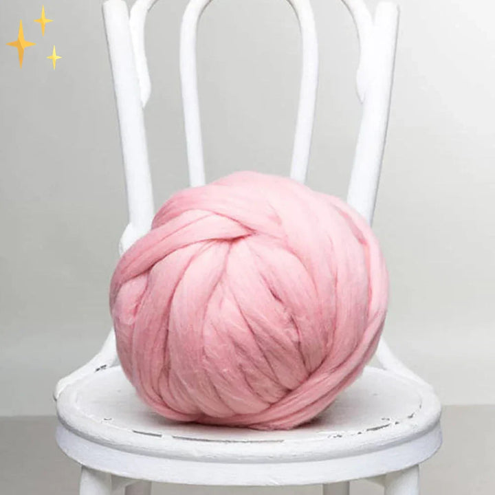 Bulk super chunky yarn, a soft and thick knitting supply for creating cozy home decor items.