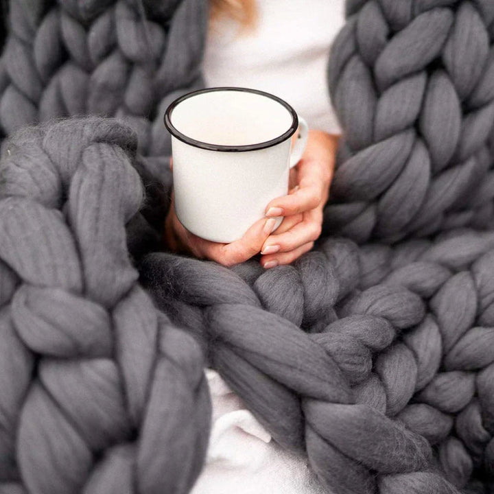 Large skein of chunky wool yarn, perfect for DIY super soft blankets & quick arm knitting.