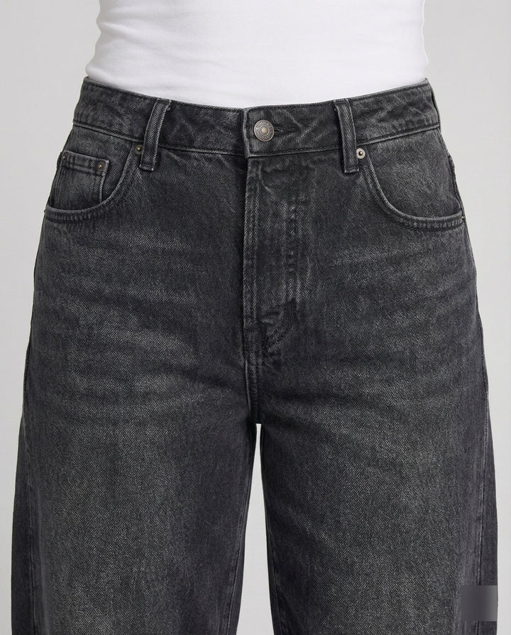Women's mid-rise relaxed fit barrel jeans, comfortable and stylish denim for daily wear.