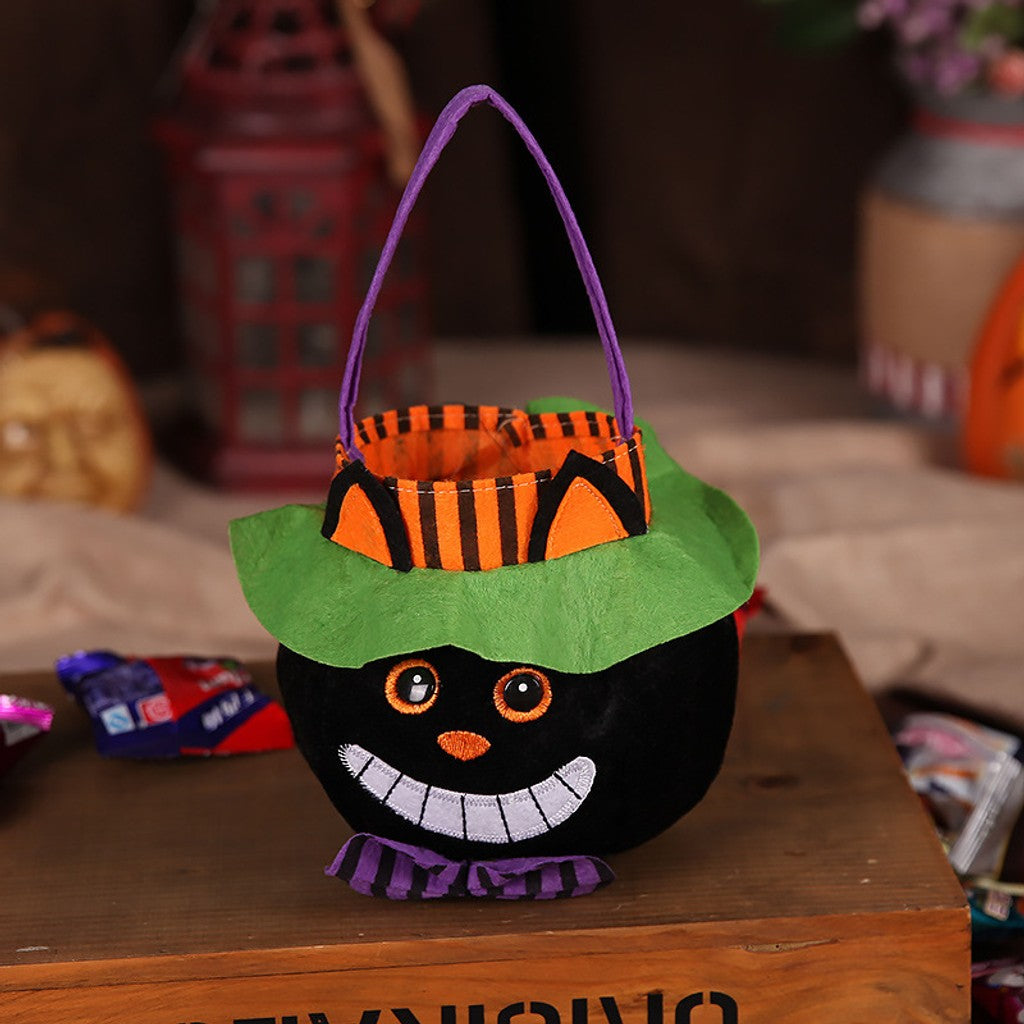 Festive kids' Halloween treat bag with pumpkin & black cat designs. Ideal for trick or treat candy collection.