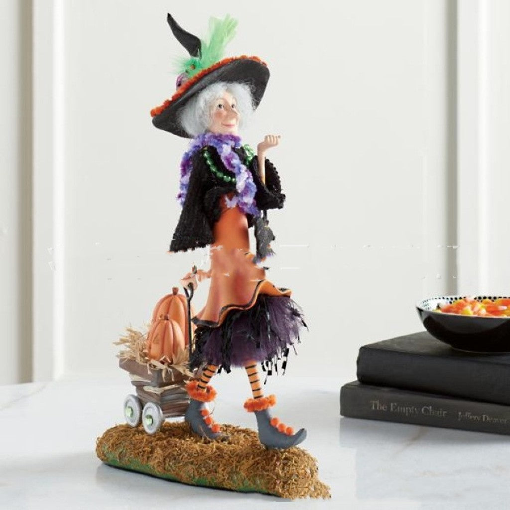 Mystic Halloween witch resin statue with pointed hat, ideal for shelf decor or fantasy art display.
