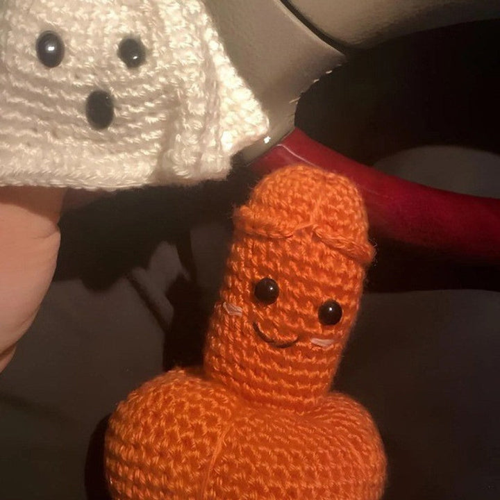 Modern ghost pumpkin crochet ornament, a cute handmade Halloween decoration for festive autumn styling.