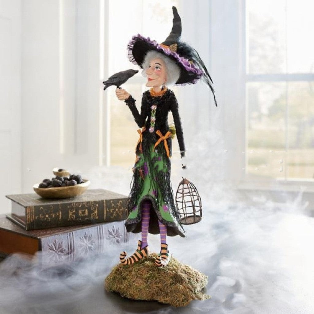 Spooky Halloween witch resin statue, perfect fantasy art for tabletop or shelf decor, a mystic accent.