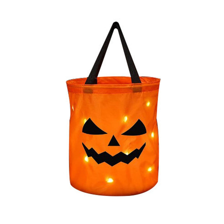 Adorable 3D pumpkin candy bag for kids' Halloween costumes. Perfect gift bag & trick-or-treat accessory for children.