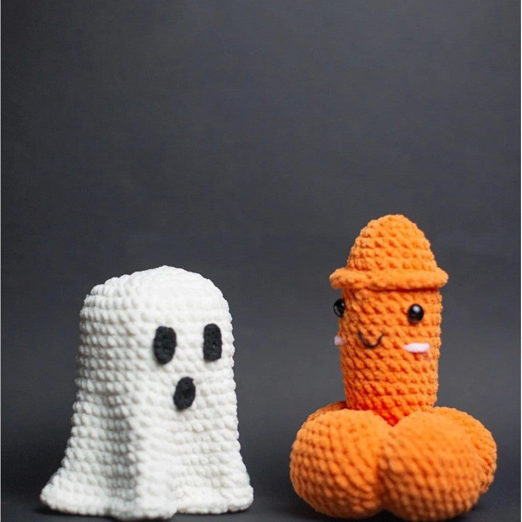 Handmade crocheted ghost pumpkin Halloween decor ornament, perfect for festive autumn home styling.