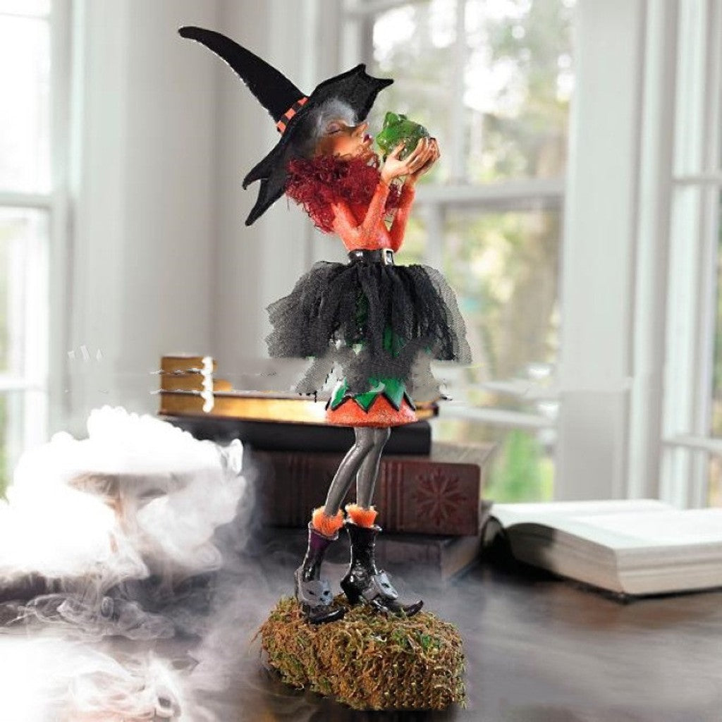 Enchanting Halloween witch figurine, a bewitching resin statue for gothic decor and holiday home accents.