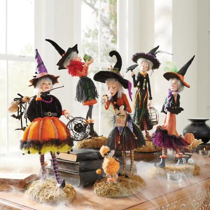 Decorative Halloween witch resin statue, a unique collectible for spooky table, shelf, or gothic home decor.