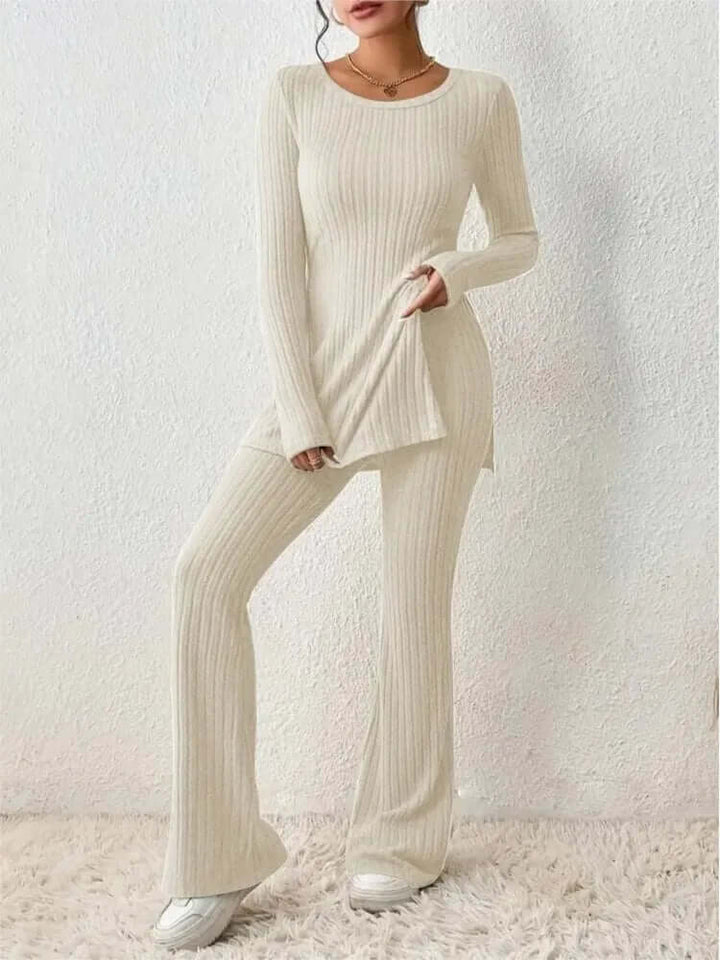 Women's fashion two-piece set: a long sleeve top and chic flared trousers for a modern, relaxed look.