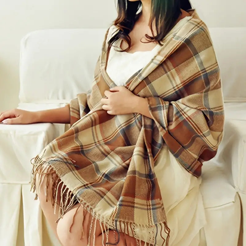 Soft & cozy Coleen cashmere scarf for women, a warm winter luxury accessory.