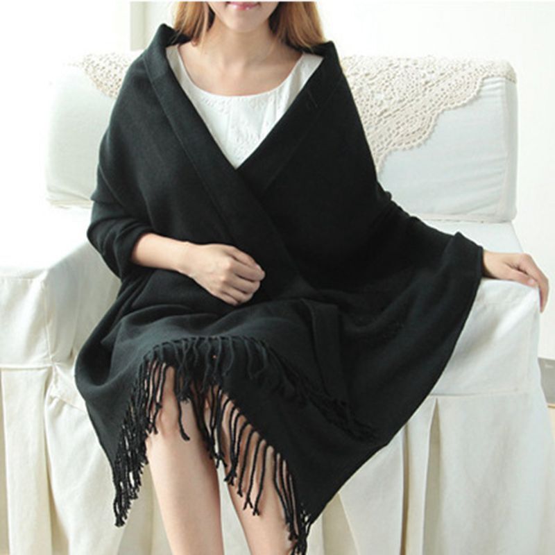 Elegant women's cashmere scarf, a chic fashion accessory for cold weather style.