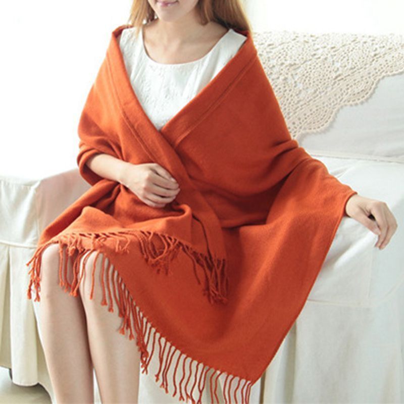 Elegant women's luxury cashmere scarf, a chic and warm winter fashion accessory.