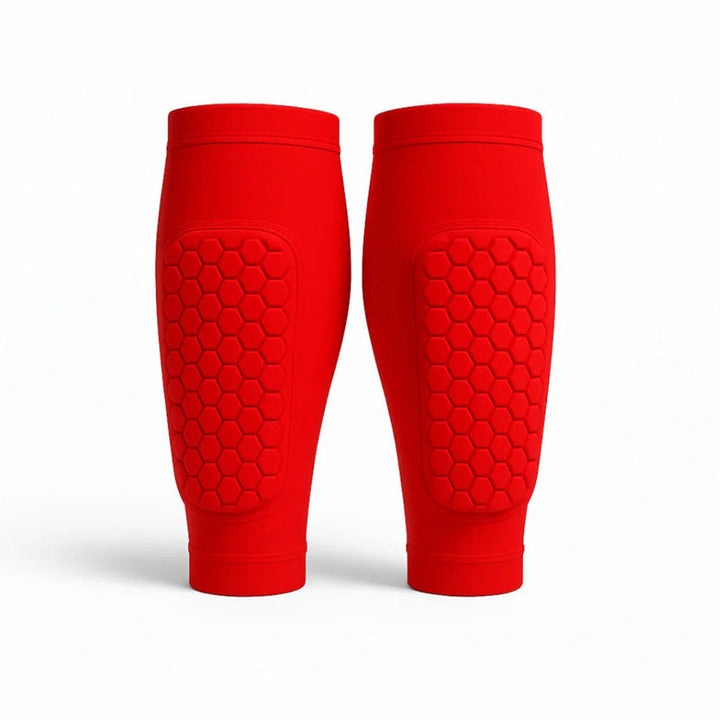 Athletic unisex shin sleeves with compression for skiing, soccer, and sports. Moisture-wicking comfort.