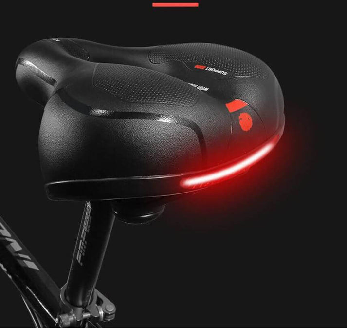 Comfortable bike saddle designed for pain relief. Unisex cycling seat for enjoyable road & MTB adventures.