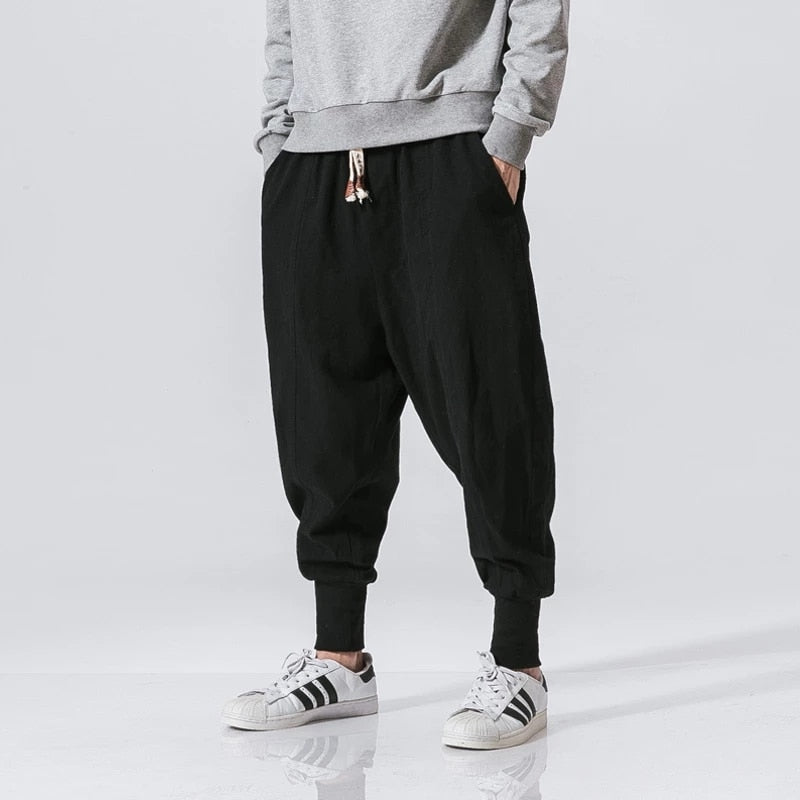 Men's comfortable black harem pants, relaxed fit, ideal for casual wear, lounging or travel.