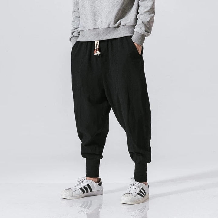 Men's comfortable black harem pants, relaxed fit, ideal for casual wear, lounging or travel.