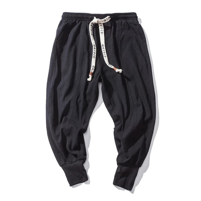Modern men's relaxed fit harem pants, combining comfort with streetwear style for versatile casual looks.