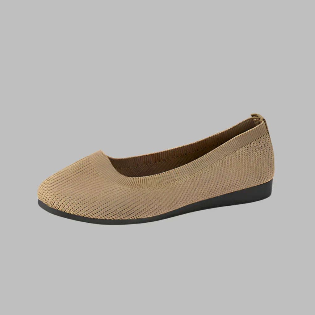 Women's lightweight orthopedic walking shoes in a neutral color, offering comfort & foot support for everyday wear.