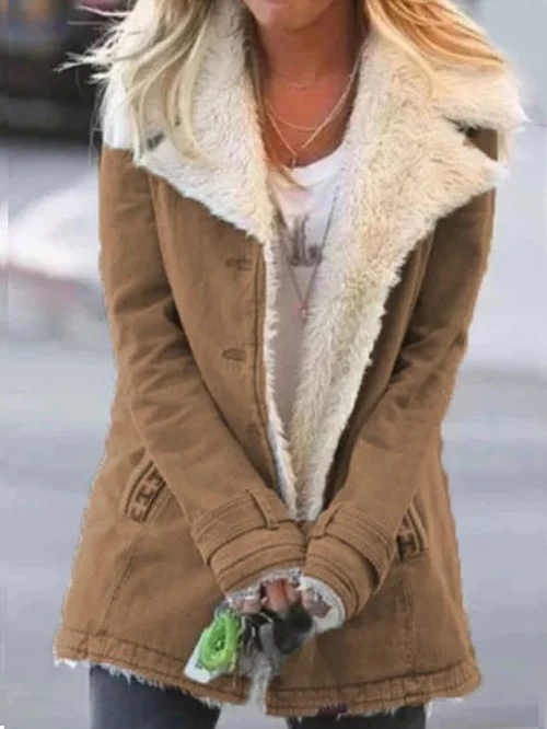 Weather-resistant women's winter jacket, stylish & warm, ideal for outdoor adventures & daily fashion.