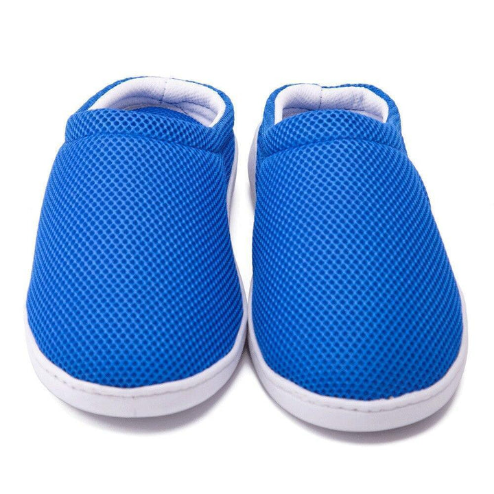 Slip-on anti-fatigue comfort slippers for men and women, offering orthopedic support.