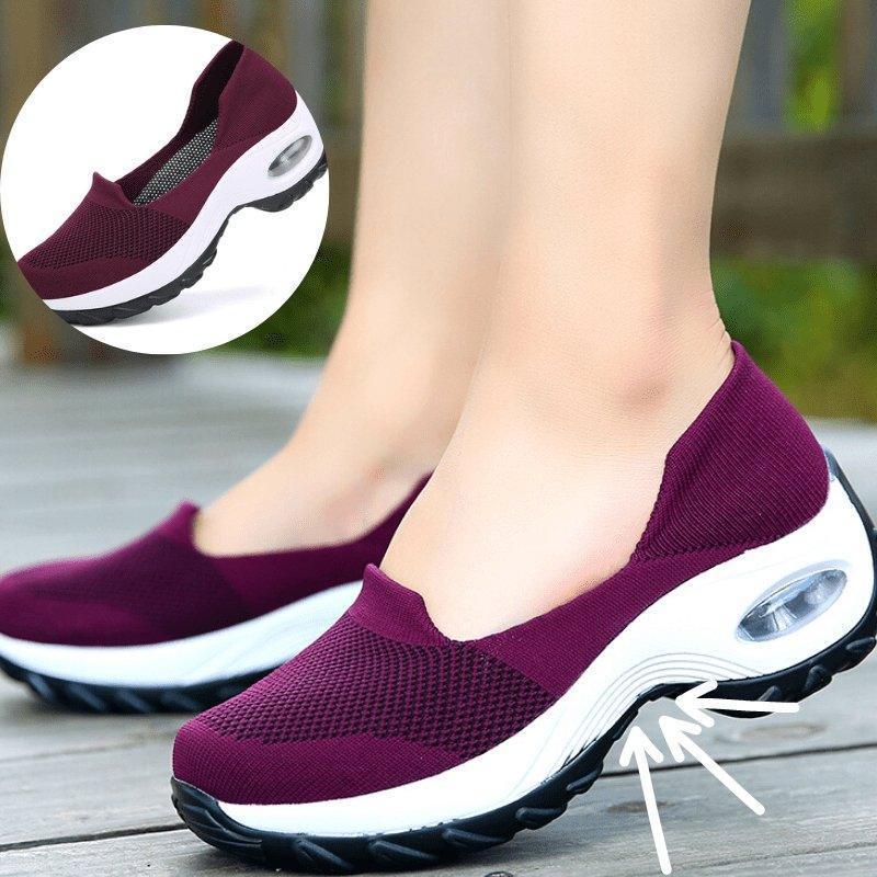 Women's walking shoes, arch support focused, with a comfortable slip-on, breathable design.