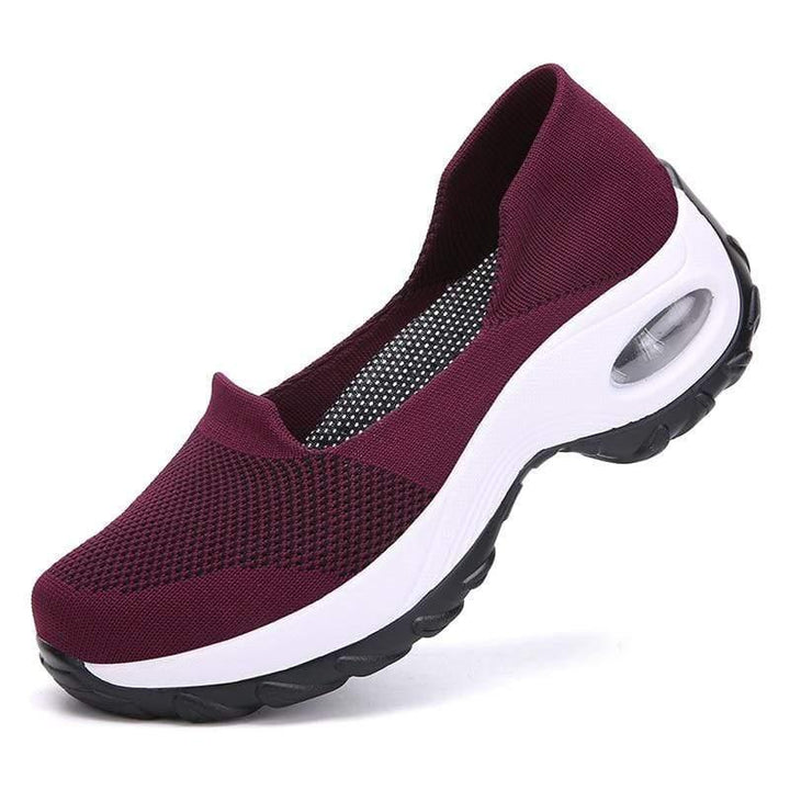 Women's comfort shoes featuring air cushion technology, ideal for arch support & long walks.