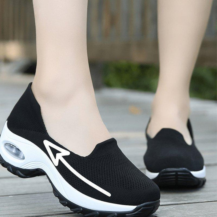 Modern women's walking shoes offering targeted arch support, breathability, and cushioning.