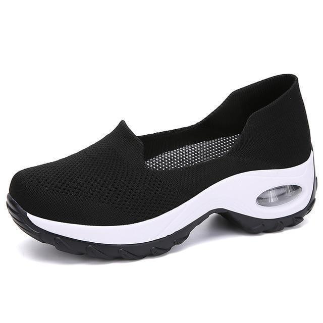 Comfortable women's slip-on walking shoes with air cushioning & arch support for daily wear.