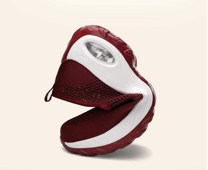 Ergonomic women's walking sneakers, air-cushioned for arch support and pain-free daily wear.