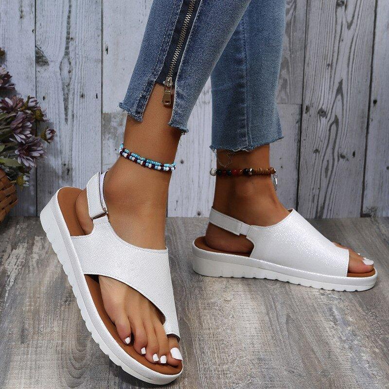 Breathable women's bunion sandals with wide toe box, secure back strap, great for walking and travel.