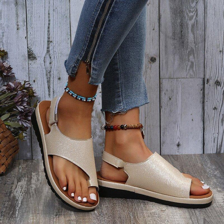 Orthopedic women's bunion sandals with arch support, wide toe box, and back strap for all-day comfort.