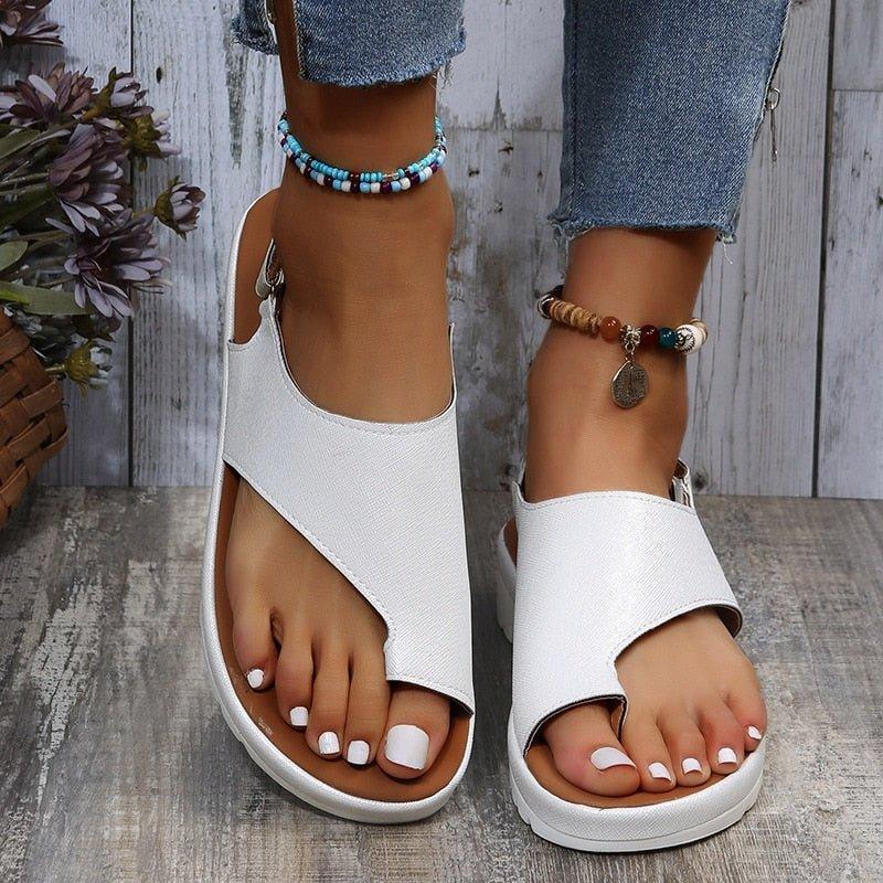 Ergonomic women's bunion sandals, wide toe box, secure back strap, offering superior comfort and support.