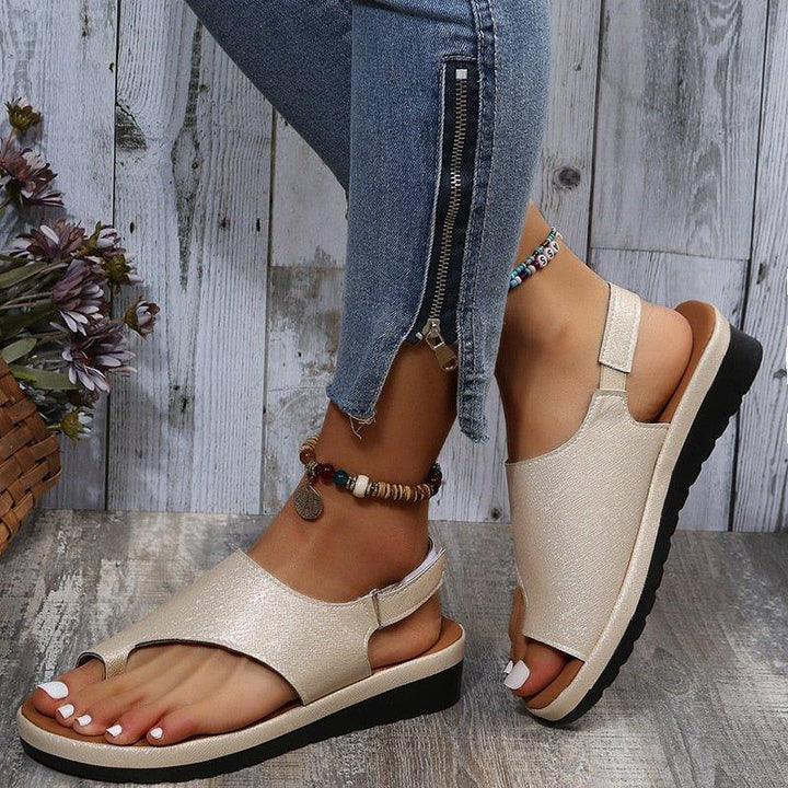 Supportive women's bunion sandals, wide toe box, secure back strap, ideal for foot pain relief.