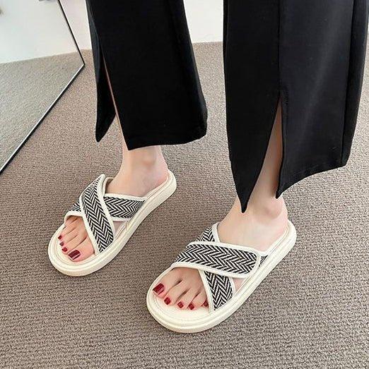 Side view: Wide comfortable women's flip-flops, featuring arch support & bunion relief for active summer wear.